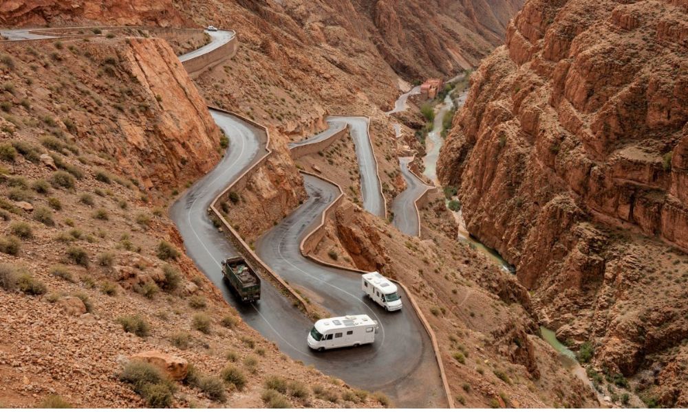 Todra Gorge Morocco – Scenic Cliffs on Marrakech to Fes Desert Tour Panoramic view of Todra Gorge cliffs and valley in Morocco during a 4-day Marrakech to Fes desert tour