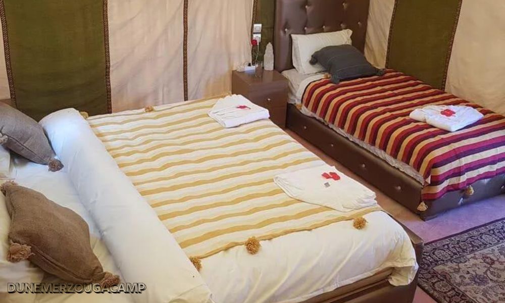 comfortable beds, soft lighting, and elegant Berber-style decor.